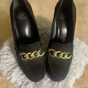Jennifer Lopez Black Flats with Gold Chain Detail